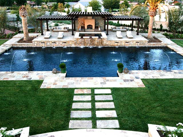 Luxury pool and spa with by Paradise Pools & Spas in Bakersfield.
